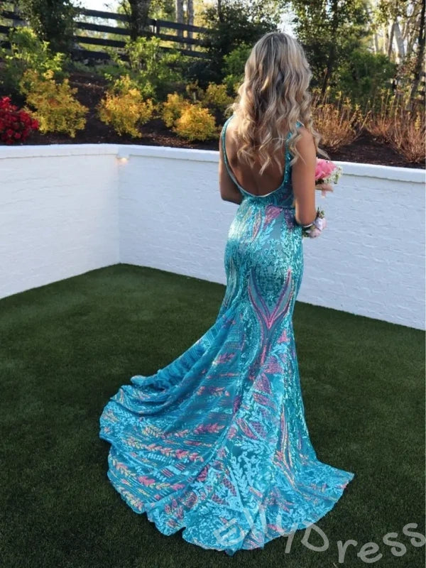Fuchsia Magenta Wide Strap Deep V-Neck Full Sequin Embroidered Mermaid Prom Dress with Tropical Leaf Pattern Iridescent Multi-Color Shimmer Open Back and Sweep Train