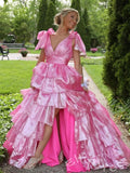 Pink Iridescent Wide Strap Bow Tie Deep V-Neck Tiered Cake Ball Gown Prom Dress with Metallic Jacquard Fabric Wide Waistband Eight-Layer Ruffles and Open Back