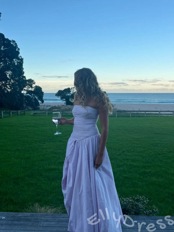 Fuchsia Strapless Straight Neck Satin Vertical Ruched Bodice Oversized A-Line Ball Gown Prom Dress with Drop Waist Front High Slit and Minimalist French Style