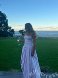 Fuchsia Strapless Straight Neck Satin Vertical Ruched Bodice Oversized A-Line Ball Gown Prom Dress with Drop Waist Front High Slit and Minimalist French Style