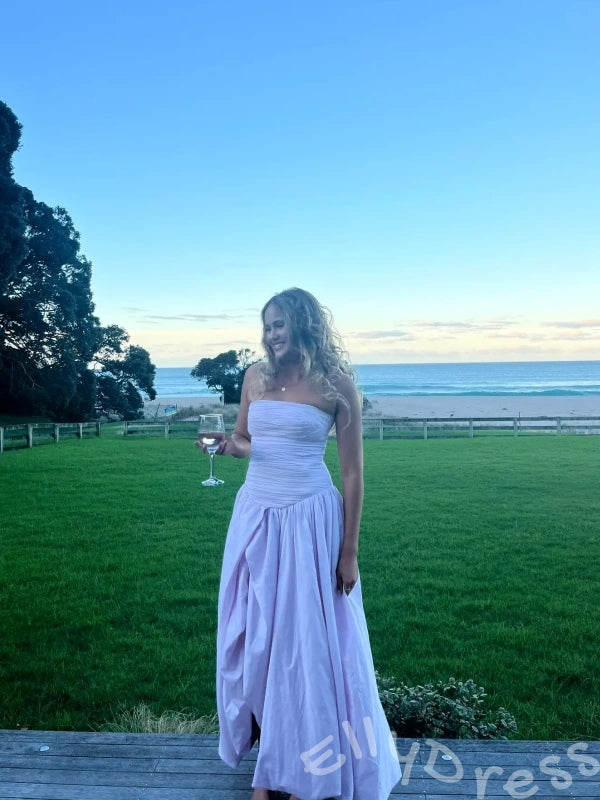 Fuchsia Strapless Straight Neck Satin Vertical Ruched Bodice Oversized A-Line Ball Gown Prom Dress with Drop Waist Front High Slit and Minimalist French Style